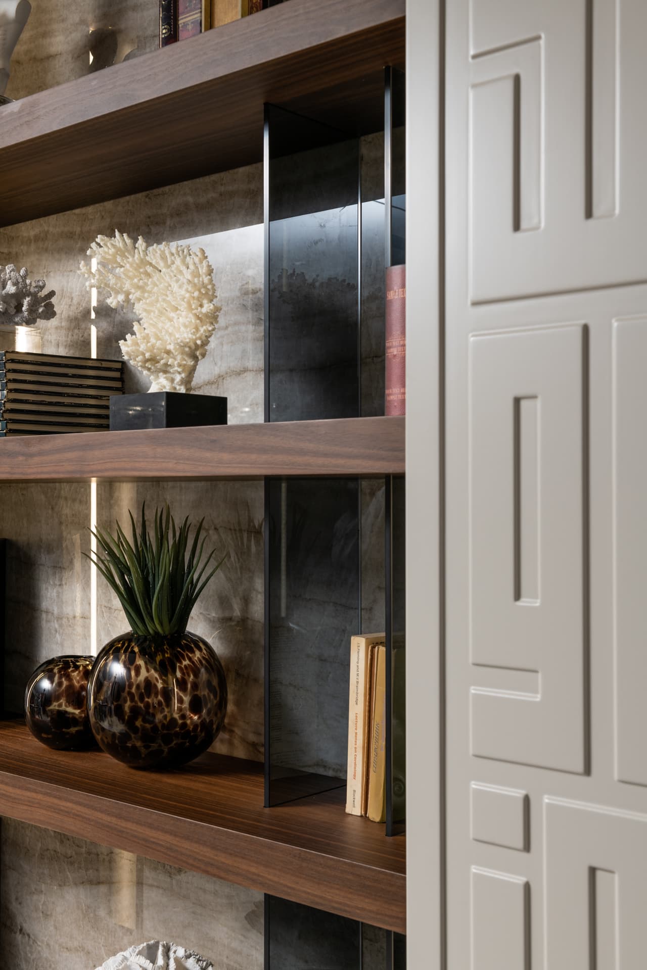 Gold geometric square handle on dark walnut pantry door