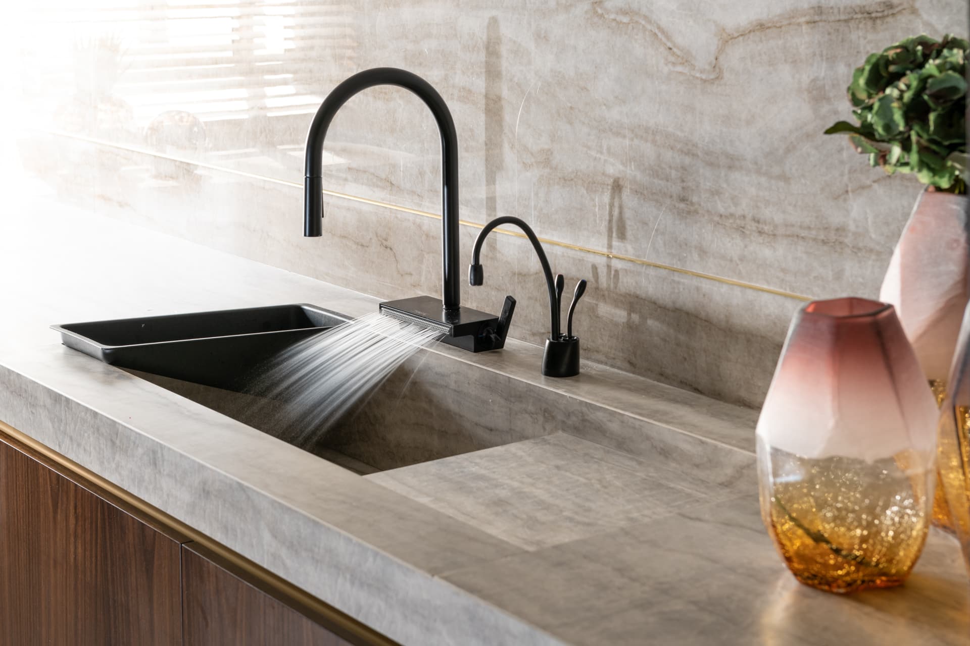 Burgundy velvet sofa with terracotta accent cushion