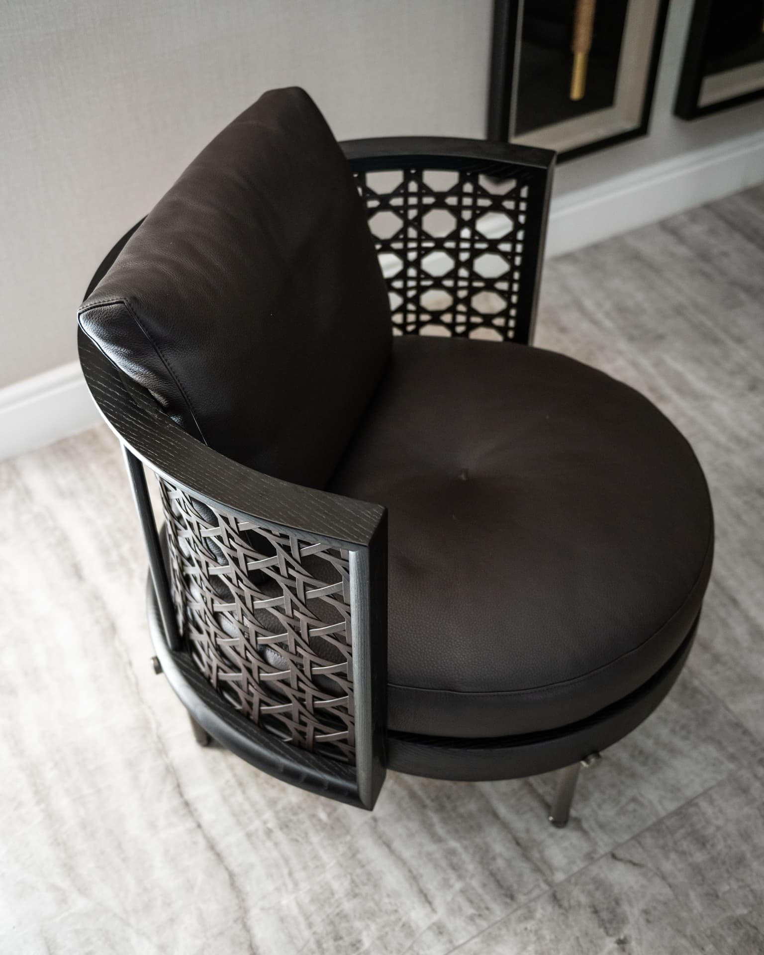 Blue-grey accent panel wall with brass pendant sconce