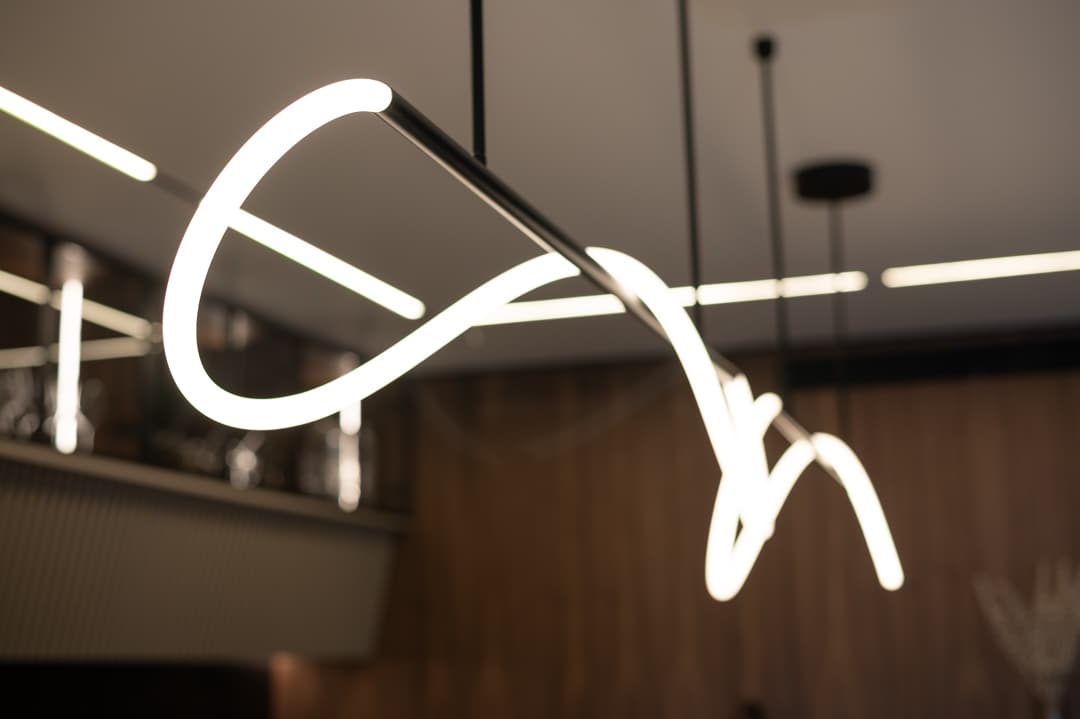 Black veined marble fireplace column with recessed display niche