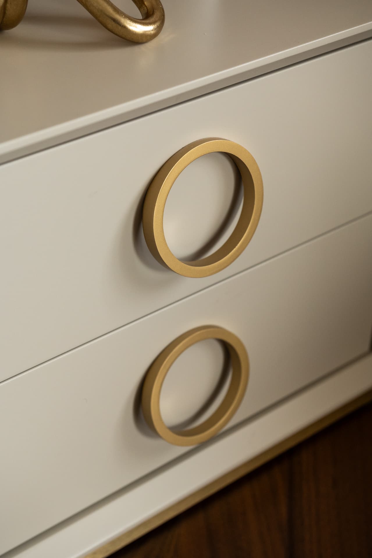 Blush crushed-velvet cloud sofa on herringbone walnut floor