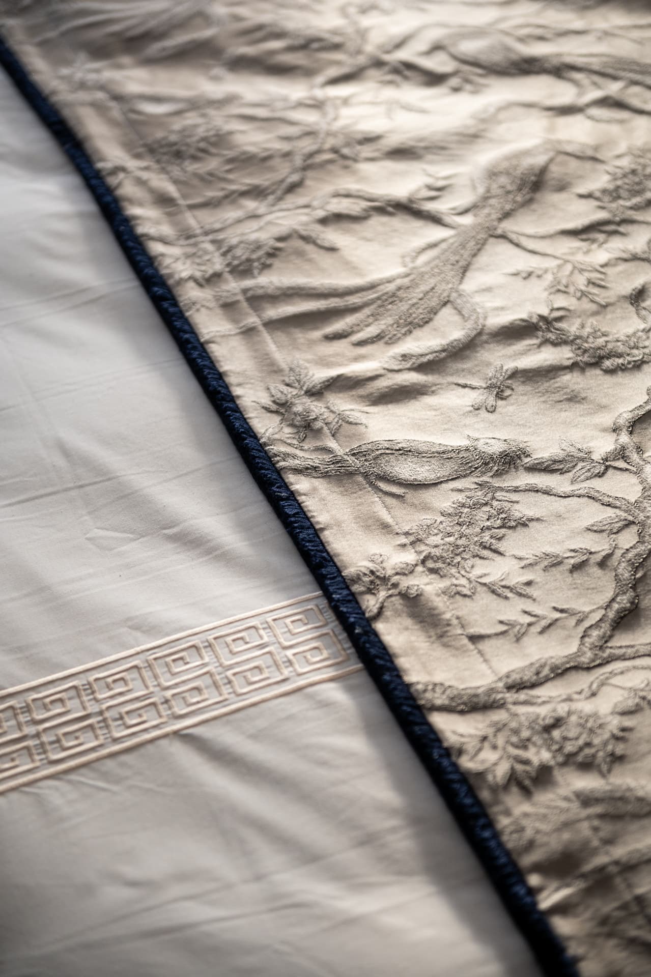 Octagonal black-framed cabinet with wild marble door panels