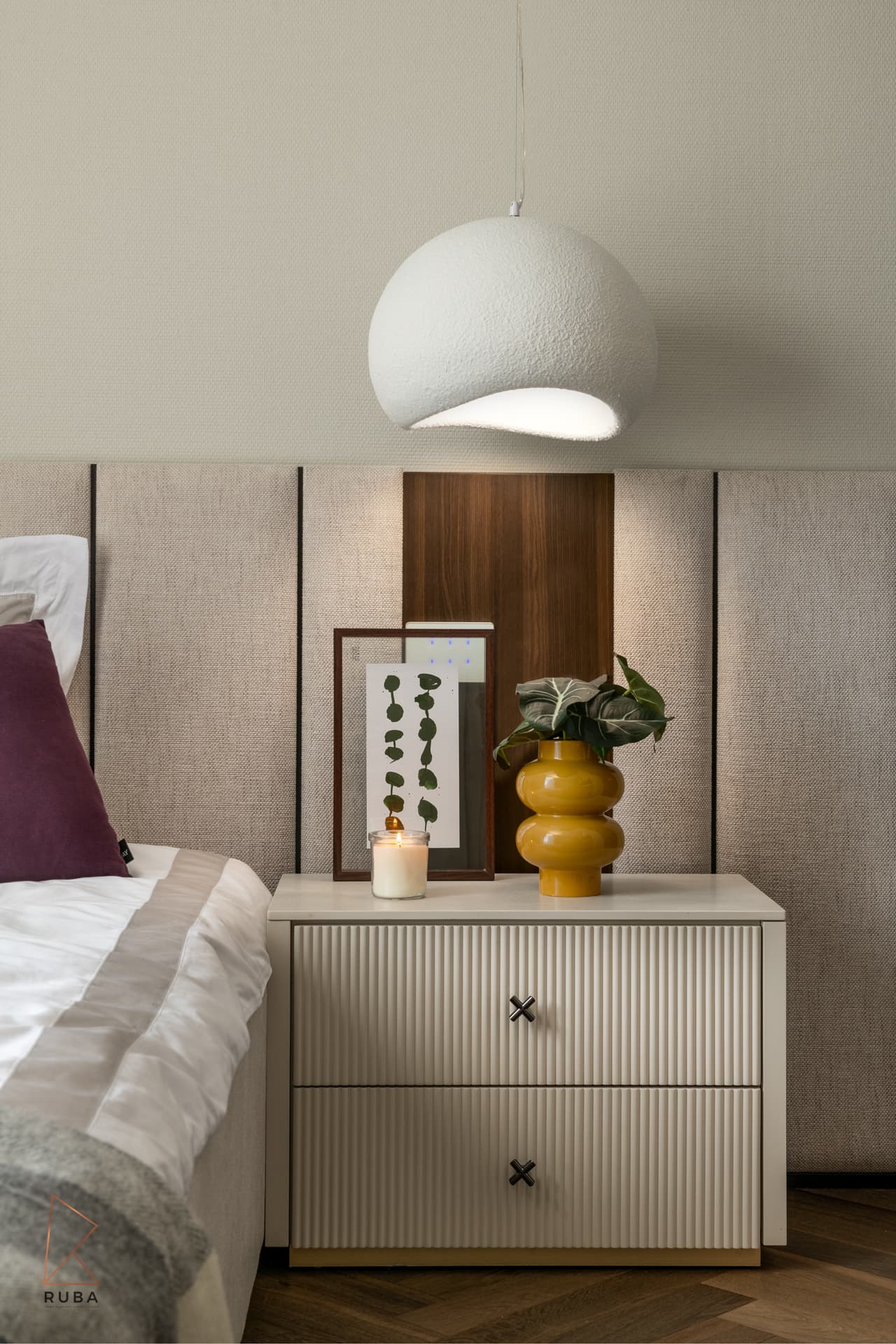 Fluted nightstand drawers with half-dome pendant lamp