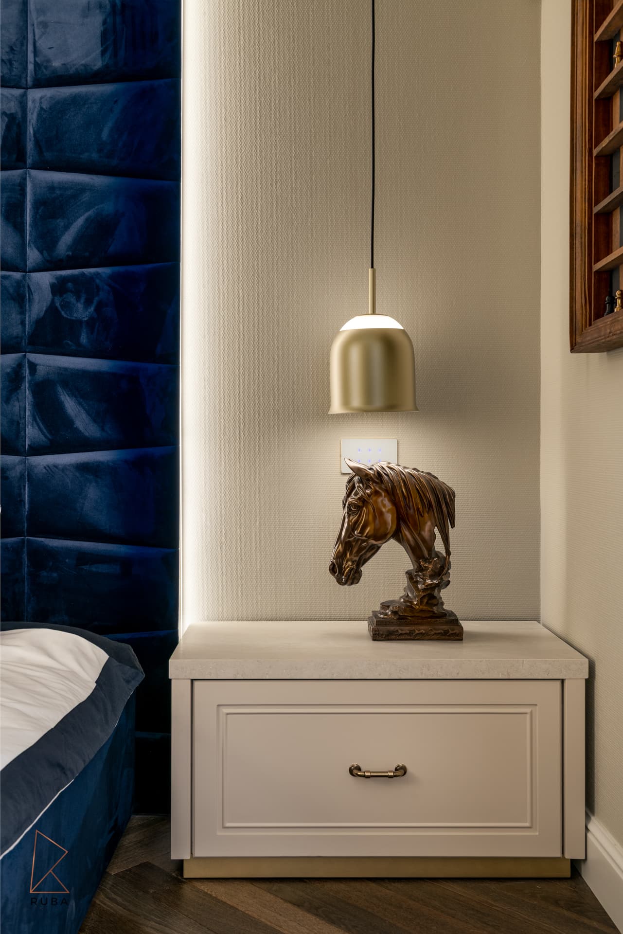 Bronze horse head sculpture with brushed brass bell pendant