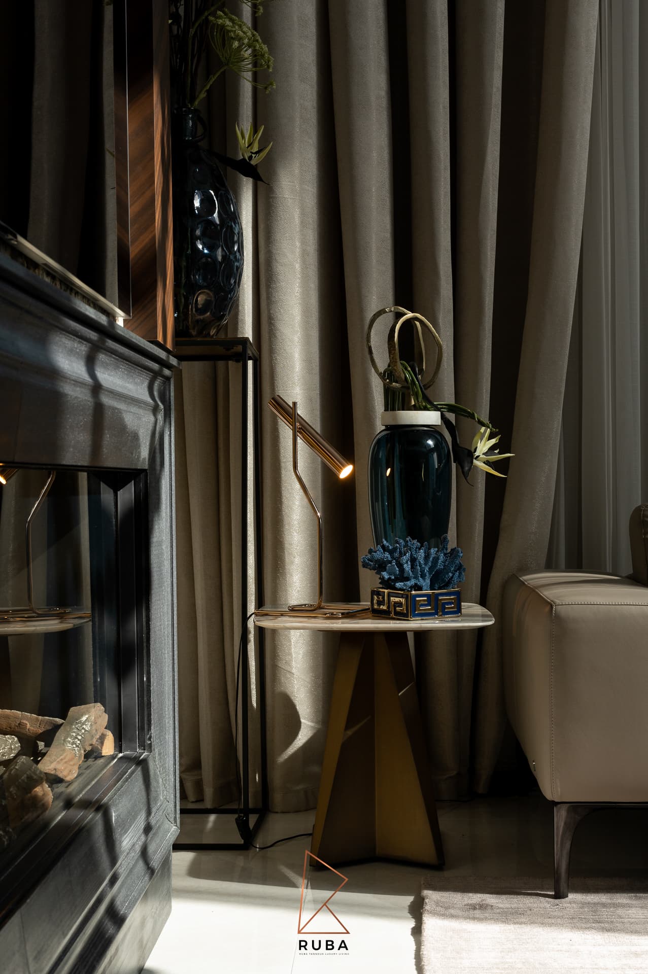 Olive-green tufted ottoman with illuminated plinth base