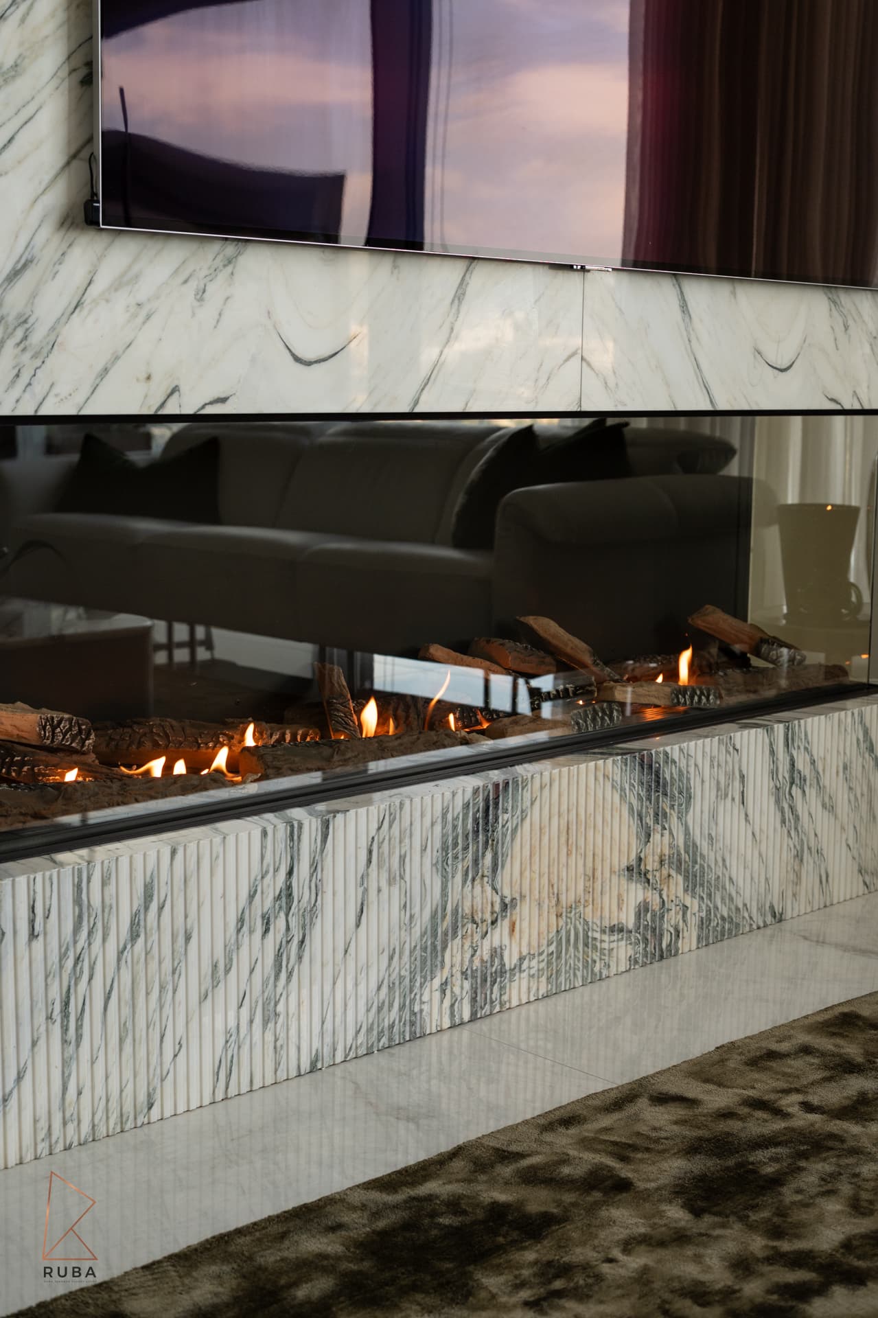 White sculpted dining chair on chromed spider-leg base