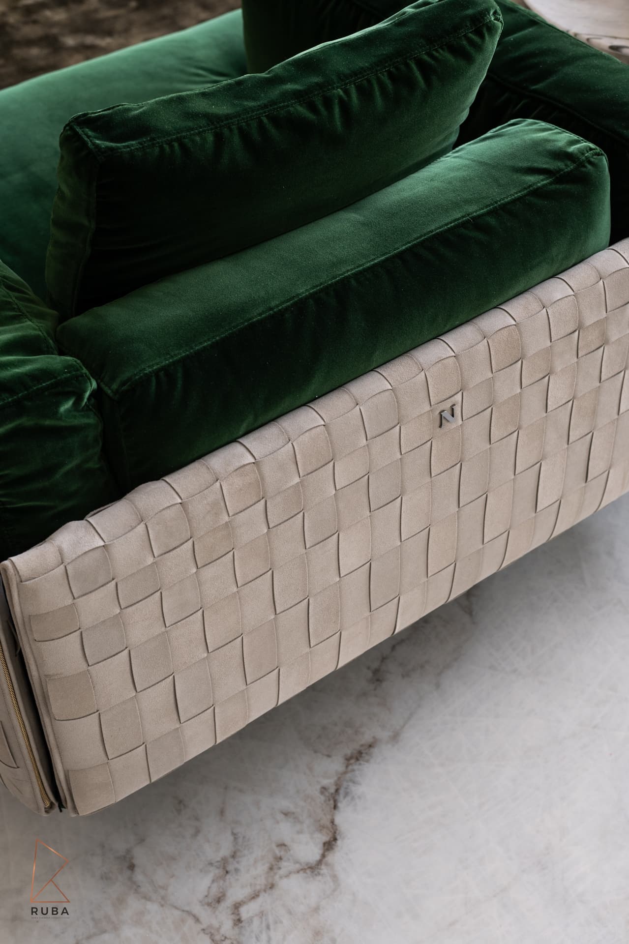 Bookmatched Patagonia marble wall with rust and cream veining