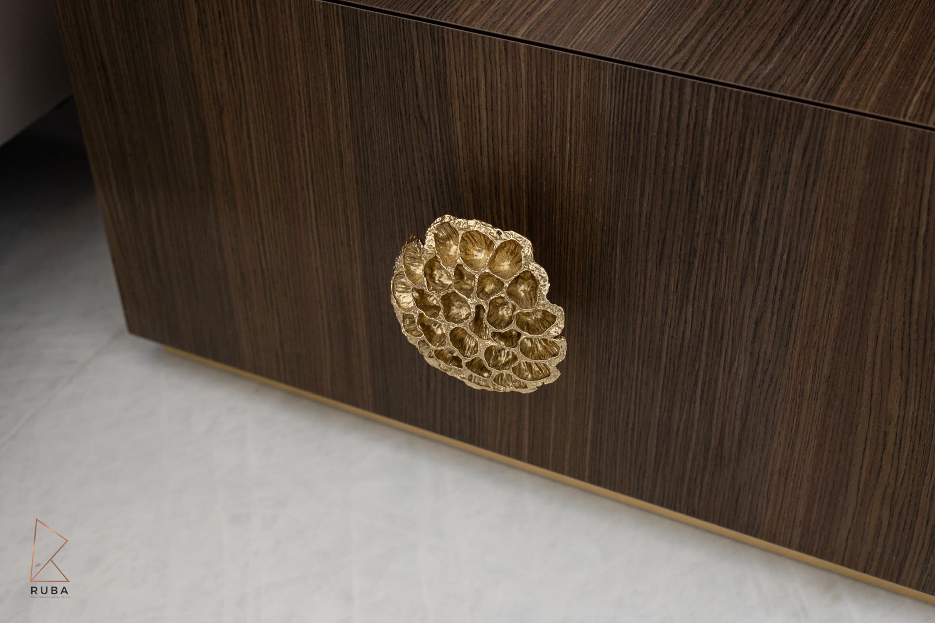 Emerald velvet bar stool on gold frame at kitchen island