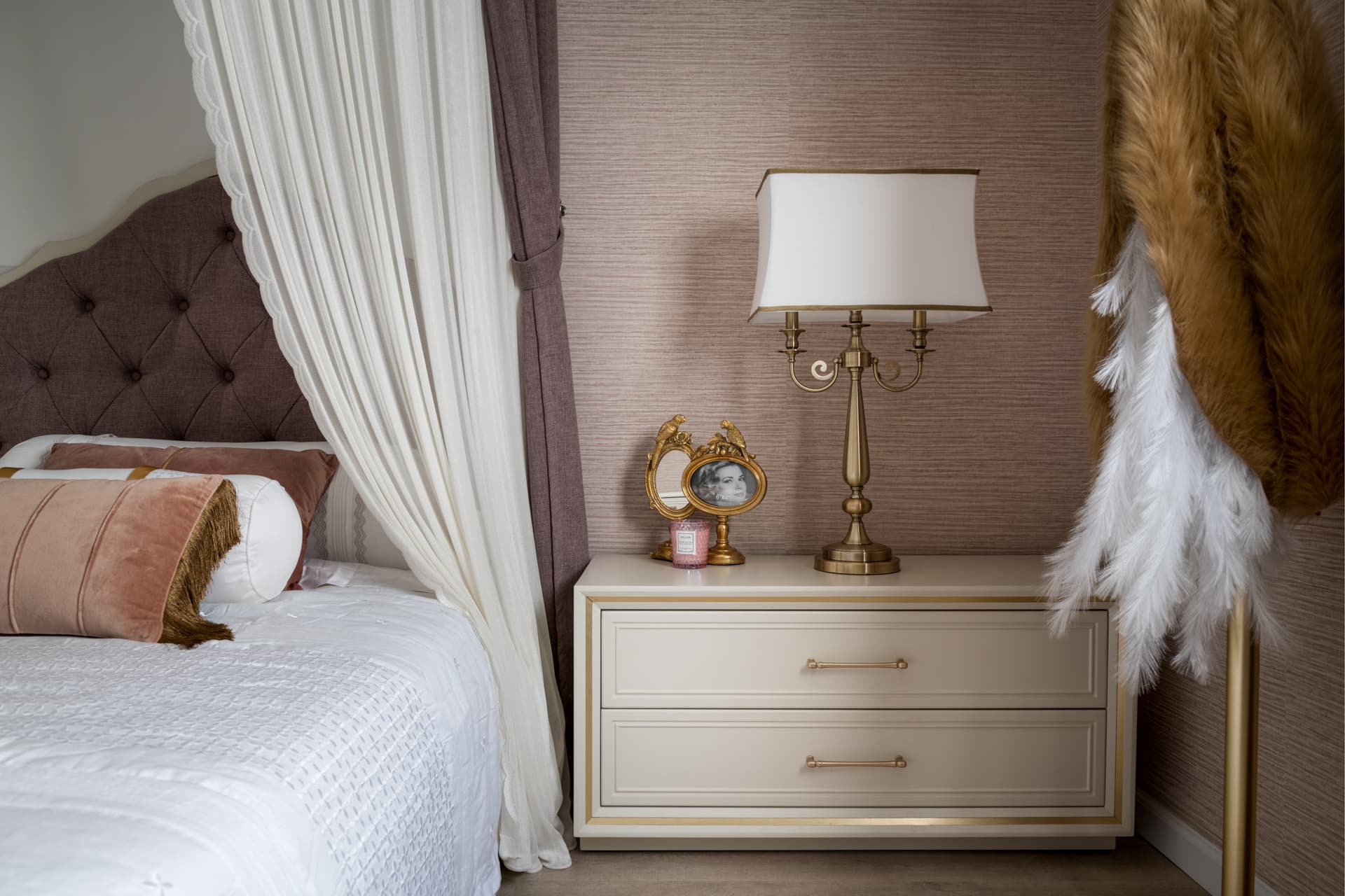 Chevron walnut veneer portal framing emerald dining alcove