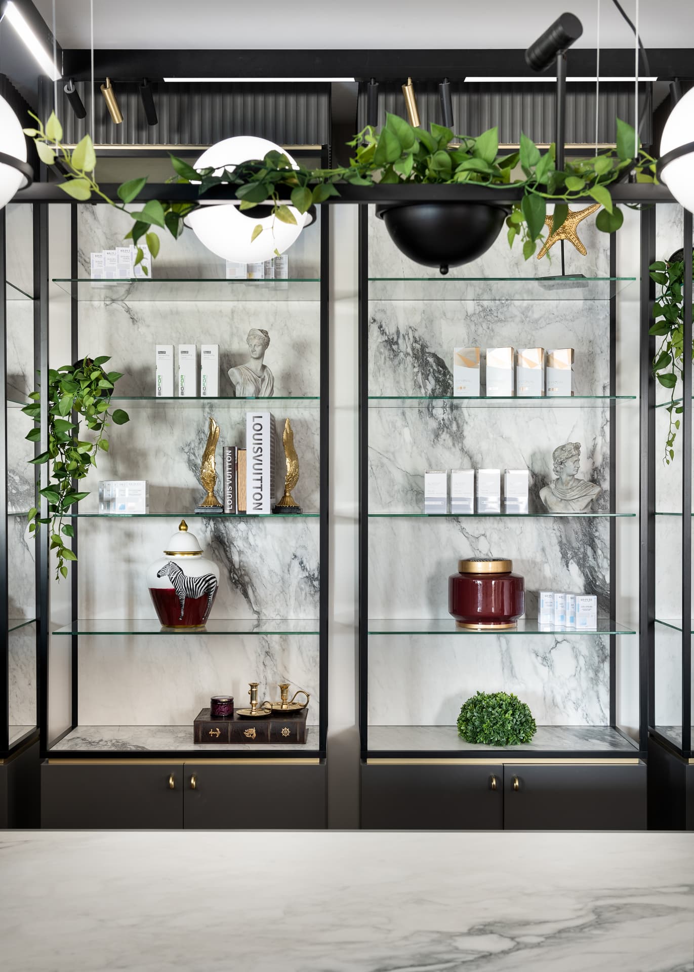 White shearling armchair on gold frame at backlit vanity station