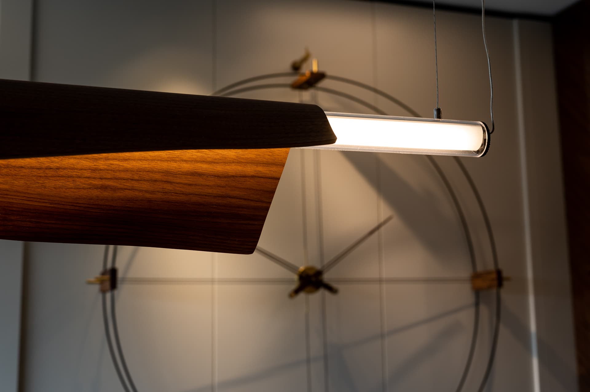 Black veined marble TV wall with gold threading and floating console