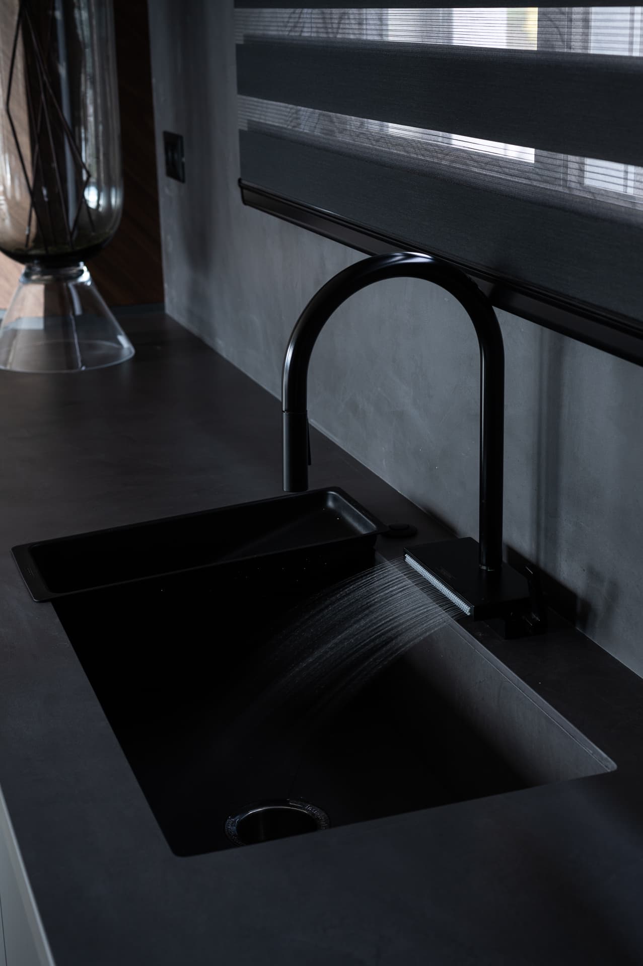 Oak-and-steel staircase with glass floor bridge to pool below