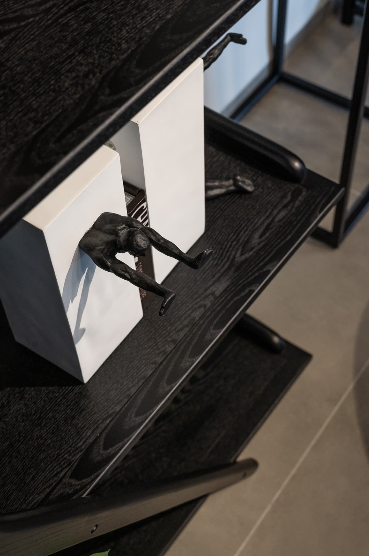 Walnut built-in desk with Ferrari crest and red neon column
