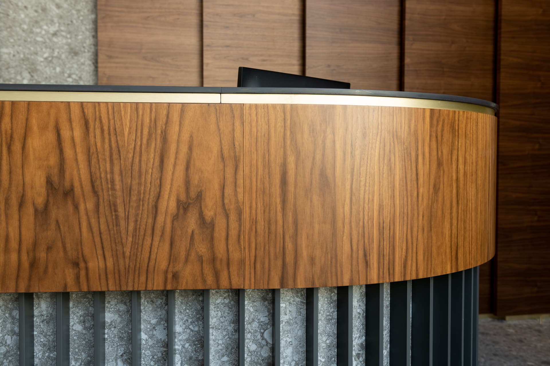 Matte black chevron double doors with diamond brass handles