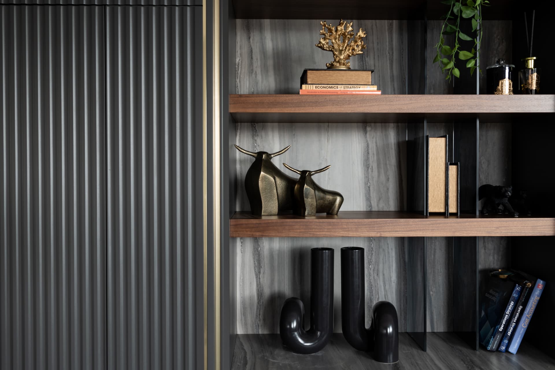 Fluted walnut conference table with brass disc base