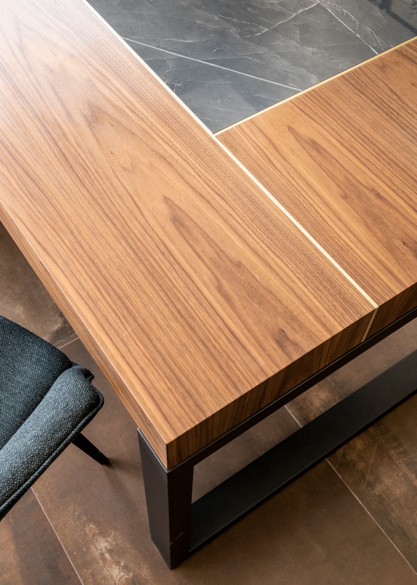 Living green wall with tropical plants beside glass office door