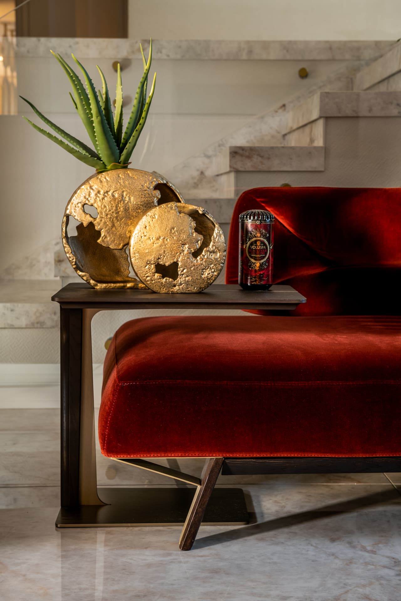 Walnut coffee table with gold tray and crystal decanters