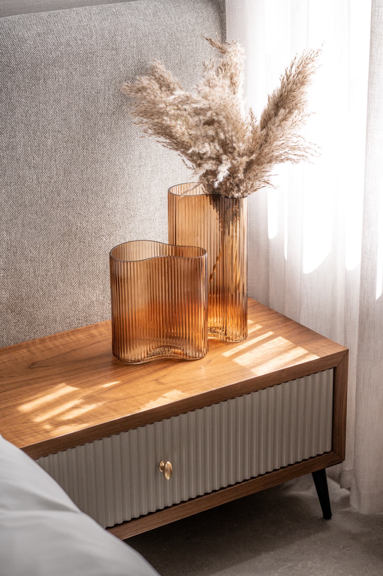 Smoked glass display cabinet with crystal stemware collection