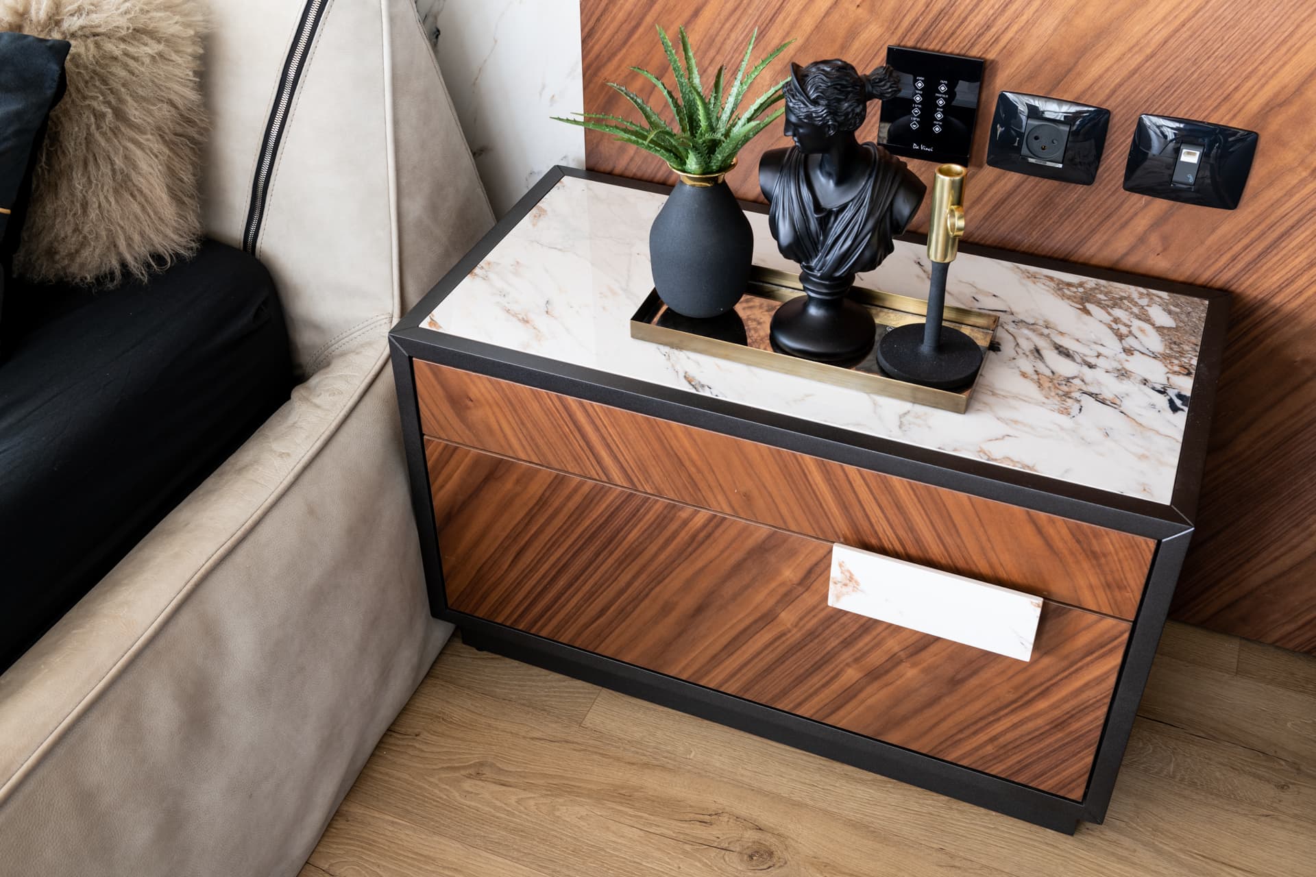 Calacatta marble and walnut veneer alternating headboard panels