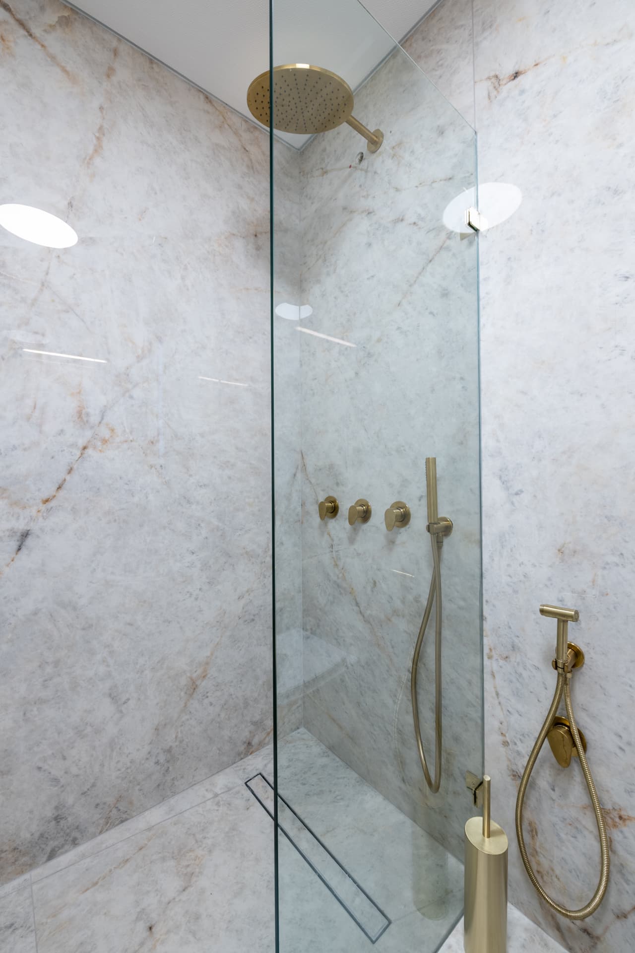 Fendi double-F walnut marquetry crest above glass liquor display